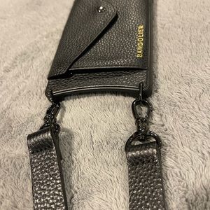 Practically New bandolier iPhone 11pro case/strap